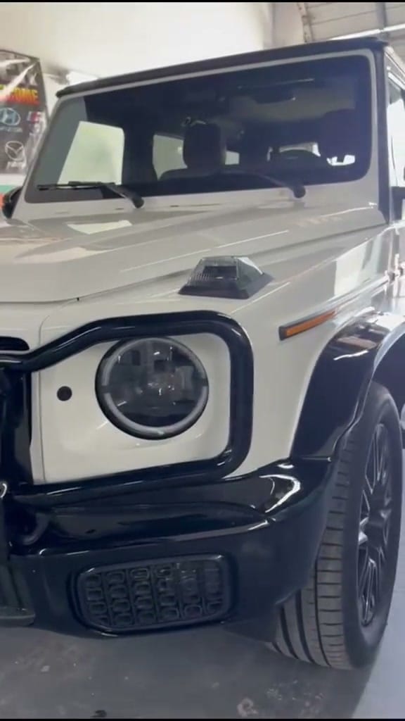 The same G-Class with the bumper repaired and refinished
