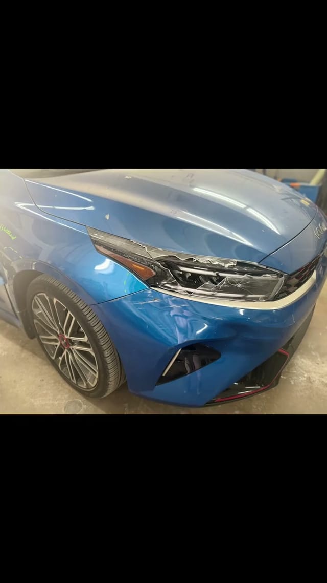 Kia Forte GT with front-end and fender damage