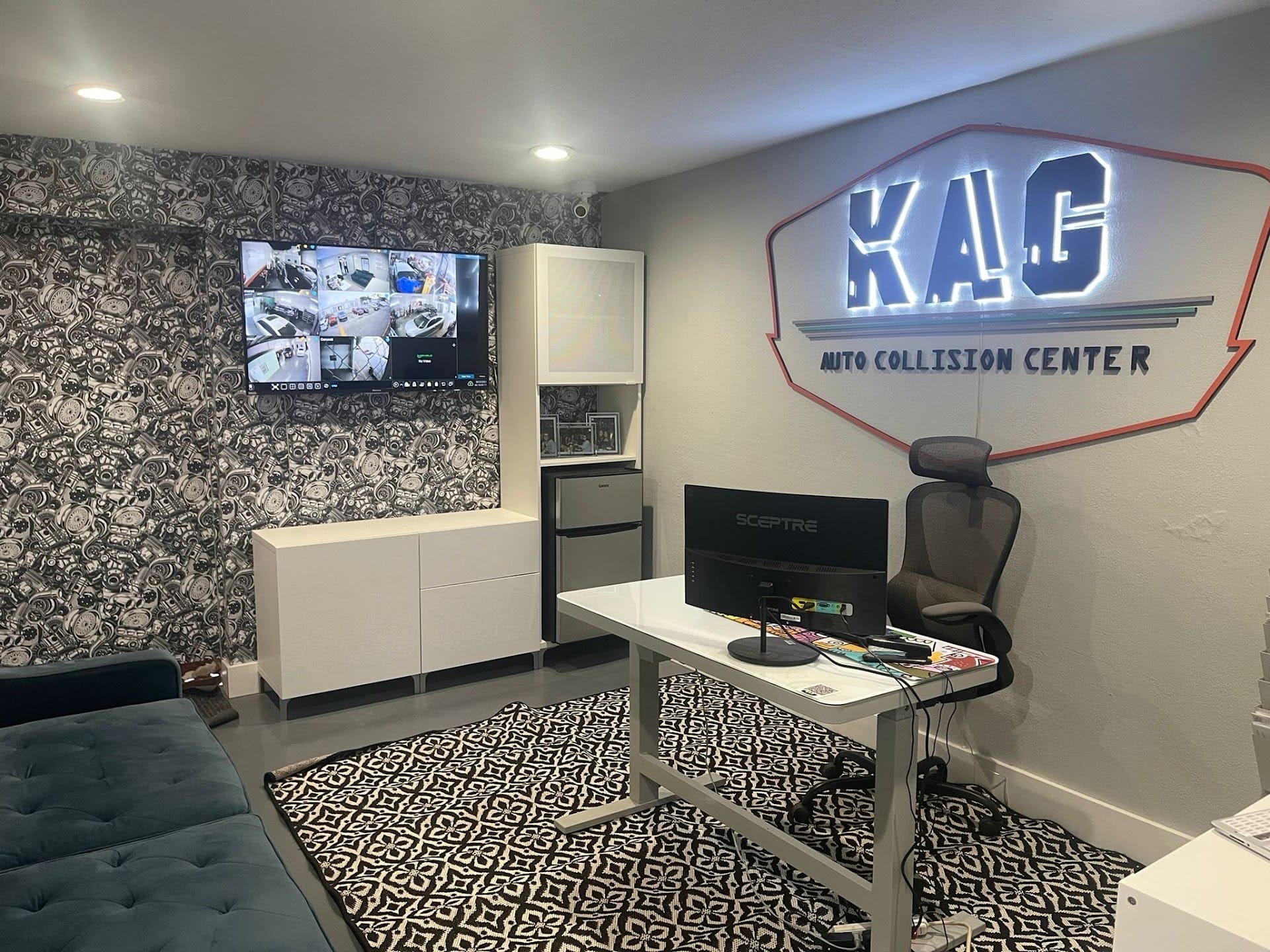 KAG Auto Collision Center office with the illuminated KAG sign