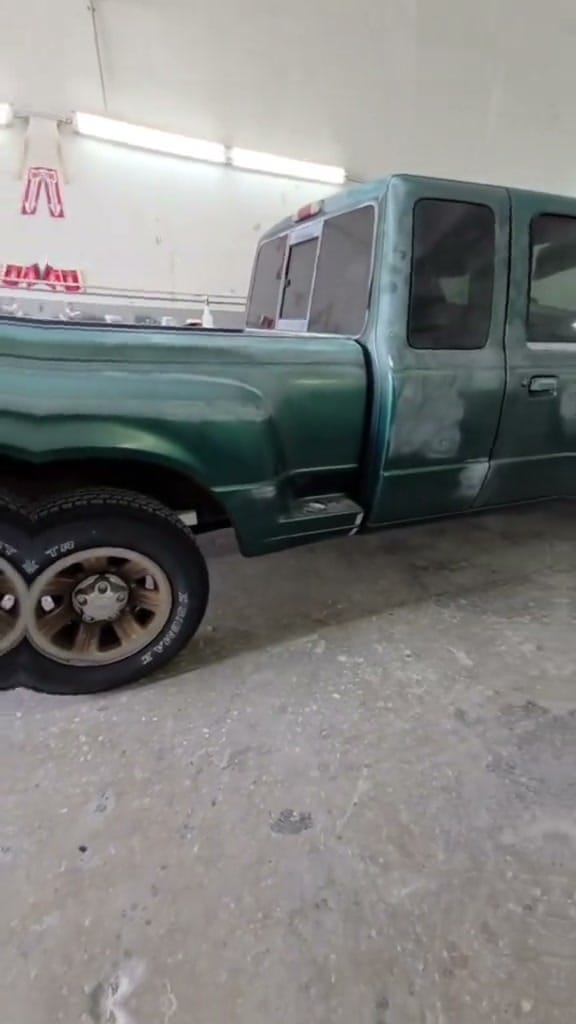 Ford Ranger with faded, oxidized green paint before a respray at KAG