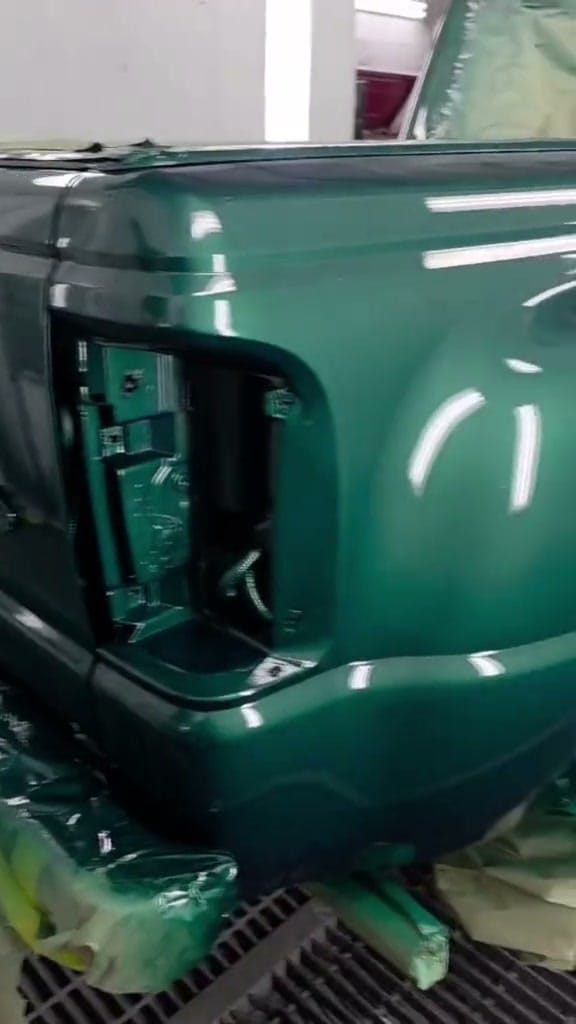 Fresh green base and clear coat going on the Ranger in the booth